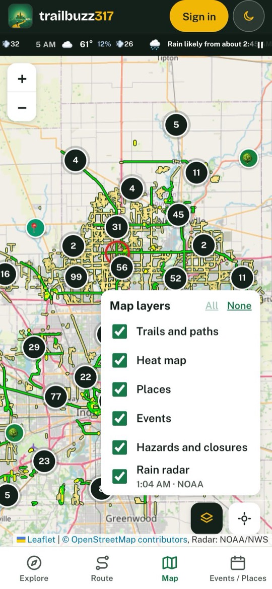 The Map tab with green trail lines, numbered clusters of places, and the Map layers panel open listing Trails and paths, Heat map, Places, Events, Hazards and closures, and Rain radar with its NOAA time.